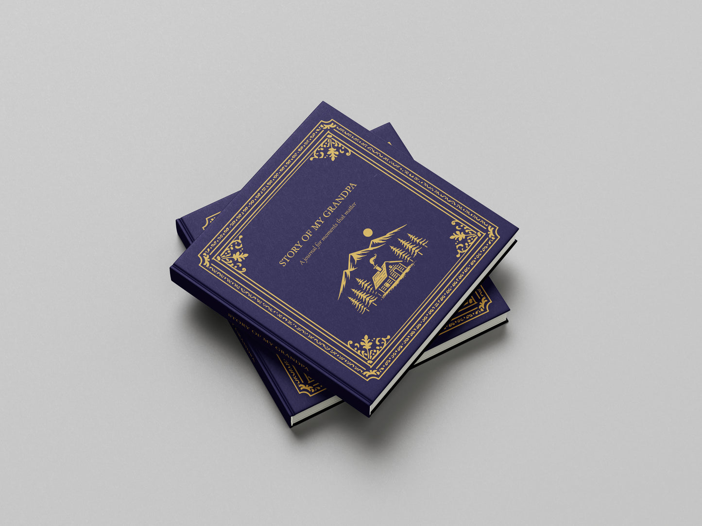 Stack of blue books with gold embossed design on a gray background