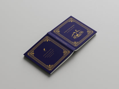 front and back cover of blue books with gold embossed designs on a gray background